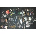 A BULK COLLECTION KEYRINGS AND CELLPHONE CHARMS SOLD AS IS