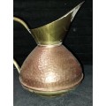 A VINTAGE BRONZE AND COPPER URN OR WATER JUG,