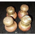 A VINTAGE SET OF 4 SALT AND PEPPER DISPENSERS MADE OF TEAK AND BRASS SOLD AS IS
