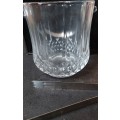 A FANCY CRYSTAL GLASS TYPE ICE BUCKET AND TONGS SOLD AS IS
