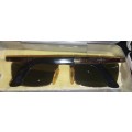 A COLLECTION OF POLICE VERSACE AND BVLGARI SPECTACLES SOLD AS IS