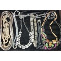 A VINTAGE JOB LOT COSTUME NECKLACES SOLD AS IS