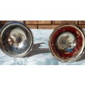 A SET STAINLESS STEEL CANDLE STANDS IN GOOD CONDITION SOLD AS IS