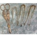 A COLLECTION OF VINTAGE EPNS TONGS