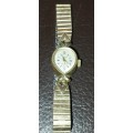AN ANTIQUE WOMANS DELFIN INCABLOC GOLD PLATED WRIST WATCH SOLD AS IS