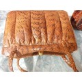 TWO SNAKE SKIN CLUTCH HAND BAGS ONE NEEDS SOME REPAIRS SOLD AS IS