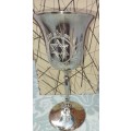 A SILVER PLATED WINE FLUTE (JUDAICA) SOLD AS IS