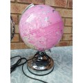 A PAIR OF WORLD GLOBE LAMPS NEEDS NEW GLOBES SOLD AS IS