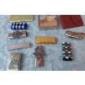A COLLECTION OF CIGARETTE AND LIGHTER HOLDERS SOLD AS IS