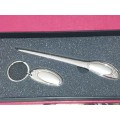 A STAINLESS STEEL LETTER OPENER GIFT SET IN GOOD CONDITION SOLD AS IS
