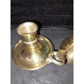 A SOLID HEAVY BRASS CANDLE STAND AND SOLID BRASS BELL