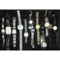 A bulk collection of quality costume quartz watches sold as is not tested