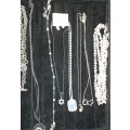 A vintage collection of quality costume necklaces pearls, crystal, gold plated and silver plated