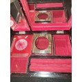 A VINTAGE BURLE WOODEN MUSICAL JEWELRY BOX WITH RED VELVET SOLD AS IS
