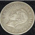 AN ANTIQUE  1947 SOUTH AFRICAN  5 SHILLING COIN IN ITS ORIGINAL STATE SOLD AS IS