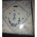 A COLLECTION OF ANTIQUE HANDKERCHIEFS SOLD AS IS