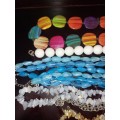 A COLLECTION OF SYNTHETIC BEAD COSTUME NECKLACES