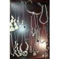 A COLLECTION OF QUALITY DESIGNER COSTUME NECKLACES SOLD AS IS