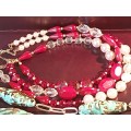 A COLLECTION OF VINTAGE FASHION COSTUME NECKLACES SOLD AS IS