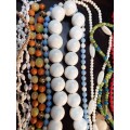 A BULK VINTAGE COLLECTION SYNTHETIC BEADED COSTUME NECKLACES