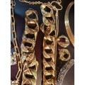 A VINTAGE COLLECTION INTERNATIONALLY DESIGNED GOLD PLATED AND GOLD TONE COSTUME JEWELRY SOLD AS IS