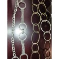 A COLLECTION OF FASHION CHAIN BELTS SOLD AS IS