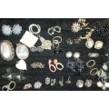 A FASHION DESIGNER COLLECTION EARRINGS, BROOCHES, AND PENDANTS SOLD AS IS