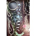 A VINTAGE COLLECTION OF COSTUME NECKLACES