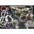 A BULK COLLECTION JOB LOT FASHION BRACELETS SOLD AS IS