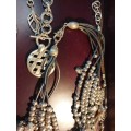 A VINTAGE COLLECTION QUALITY COSTUME NECKLACES SOLD AS IS