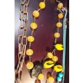 A VINTAGE COLLECTION OF COSTUME NECKLACES SOLD AS IS
