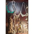 A DISCERNING LADY`S COLLECTION OF VINTAGE COSTUME NECKLACES SOLD AS IS
