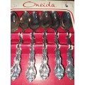 TWO VINTAGE SETS OF COMMUNITY PLATED TEASPOONS IN THEIR ORIGINAL BOXES