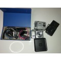 A JOB LOT FITBITS AND ELECTRONIC ITEMS AND CAMERAS