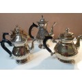 A VINTAGE COLLECTION OF VICTORIAN SILVER PLATED TEAPOTS SOLD AS IS