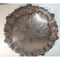 A VINTAGE 43 TO 44-CENTIMETER VICTORIAN SILVER PLATED WITH ORNATE DESIGNS SERVING TRAY