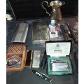 A COLLECTION OF FLASKS CIGARETTE LIGHTERS  POCKET KNIVES AND A LEATHER CIGARETTE HOLDER SOLD AS IS