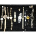 A VINTAGE JOB LOT WOMANS WATCHES SOLD AS IS NOT TESTED