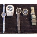 A COLLECTION OF WRIST WATCHES AND A CLOCK SOLD AS IS NOT TESTED