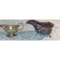 TWO ANTIQUE SAUCE JUGS ONE NEEDS A HANDLE REPLACED SOLD AS IS