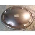 A VINTAGE STAINLESS STEEL SERVING TRAY NEEDS POLISHING