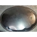 A VINTAGE STAINLESS STEEL SERVING TRAY NEEDS POLISHING