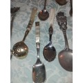 A COLLECTION OF KITCHENALIA VINTAGE CUTLERY SOLD AS IS