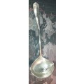A SOLID SILVER PLATED SOUP LADLE APPROXIMATELY 33 CENTIMETERS IN LENGTH