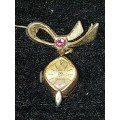 AN ANTIQUE SWISS-MADE ATLANTIC 17 JEWELS BROOCHE WATCH WITH A RUBY STONE