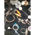 A MIXED COLLECTION VINTAGE RINGS ,EARRINGS AND GOLDPLATED AND SILVER PLATED BRACELETS