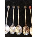 A SET OF 12 COFFEE BEAN SPOONS