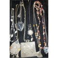 A VINTAGE COLLECTION TRIBAL-STYLE BRONZE AND SILVER PLATED COSTUME NECKLACES