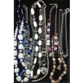 A VINTAGE COLLECTION DESIGNER COSTUME NECKLACES SOLD AS IS