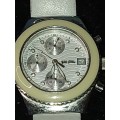 A FOLLI FOLLIE WITH WHITE ENEMAL BAZEL D/D AND WHITE LEATHER BAND